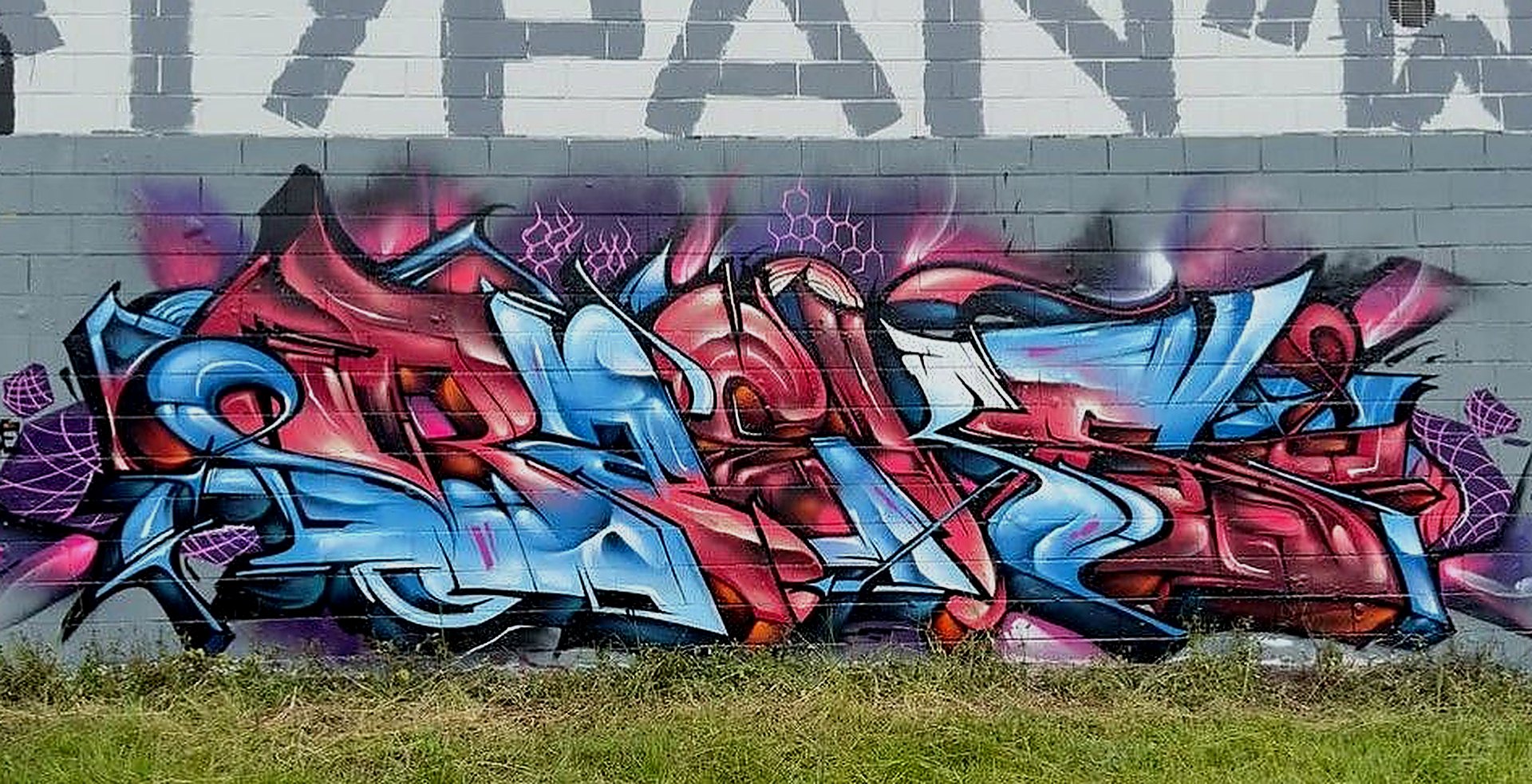 Blue and red graffiti mural
